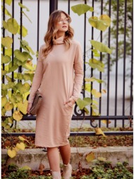 loose dress with turtleneck and beige pockets