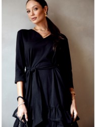simple black dress with ruffles and belt