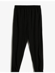 koton jogger sweatpants with zipper pocket detail.