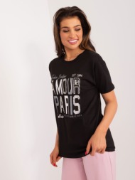 black t-shirt with lettering and appliqués