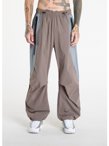 παντελόνια nike tech men`s dri-fit woven color-block σε προσφορά