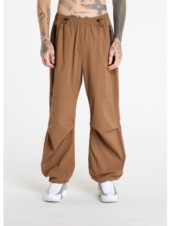παντελόνια nike tech men`s woven oversized pants mosswood σε προσφορά
