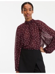 πουκάμισο με ψηλό γιακά και πουά σχέδιο