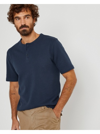 κοντομάνικη μπλούζα με κουμπιά στη λαιμόκοψη