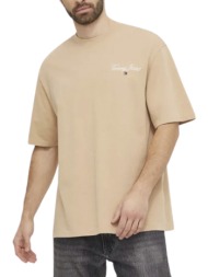 ανδρικό oversized serif linear t-shirt μπεζ tommy jeans dm0dm18575-ab0