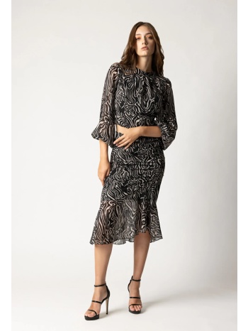 εμπριμέ μίντι ασύμμετρη φούστα με βολάν