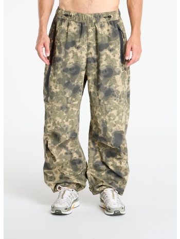 παντελόνια nike tech men`s dri-fit woven camo loose-fit σε προσφορά
