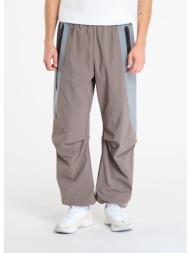 παντελόνια nike tech men`s dri-fit woven color-block oversized pants cave stone/ cool grey/ black xl