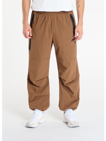 παντελόνια nike tech men`s woven oversized pants mosswood σε προσφορά