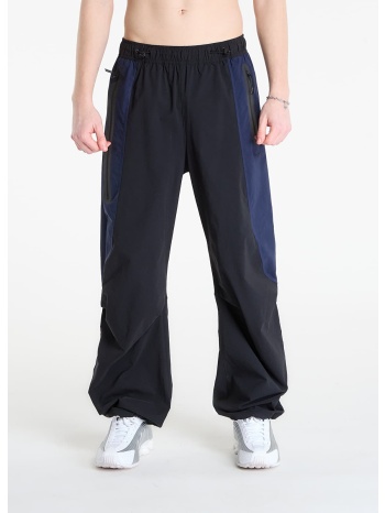 παντελόνια nike tech men`s dri-fit woven color-block pants σε προσφορά