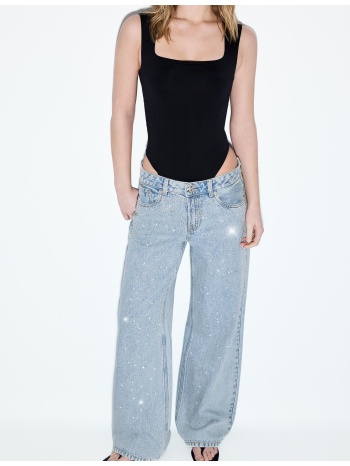 stradivarius χαμηλόμεσο τζιν με φαρδύ μπαντζάκι και γκλίτερ